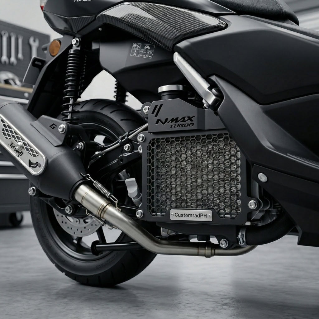 The CustomradPH Yamaha NMAX Tech Max Radiator Cover installed on the right-side engine bay of the scooter. This black powder-coated CNC steel motorcycle accessory features a rugged honeycomb mesh design that aligns perfectly with the bike's factory side panels and exhaust routing. The direct-fit, plug-and-play cover prominently displays a precision-cut NMAX TURBO logo and brushed metal CustomradPH badge, giving the NMAX a sharper, more finished profile.