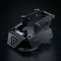Black powder-coated CNC steel Honda ADV 160 Face Enhancer by CustomradPH, featuring a distinct triangular front cutout, riveted metal badge, and slotted side brackets designed for an aggressive front fairing styling upgrade.