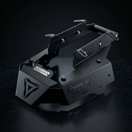 Black powder-coated CNC steel Honda ADV 160 Face Enhancer by CustomradPH, featuring a distinct triangular front cutout, riveted metal badge, and slotted side brackets designed for an aggressive front fairing styling upgrade.